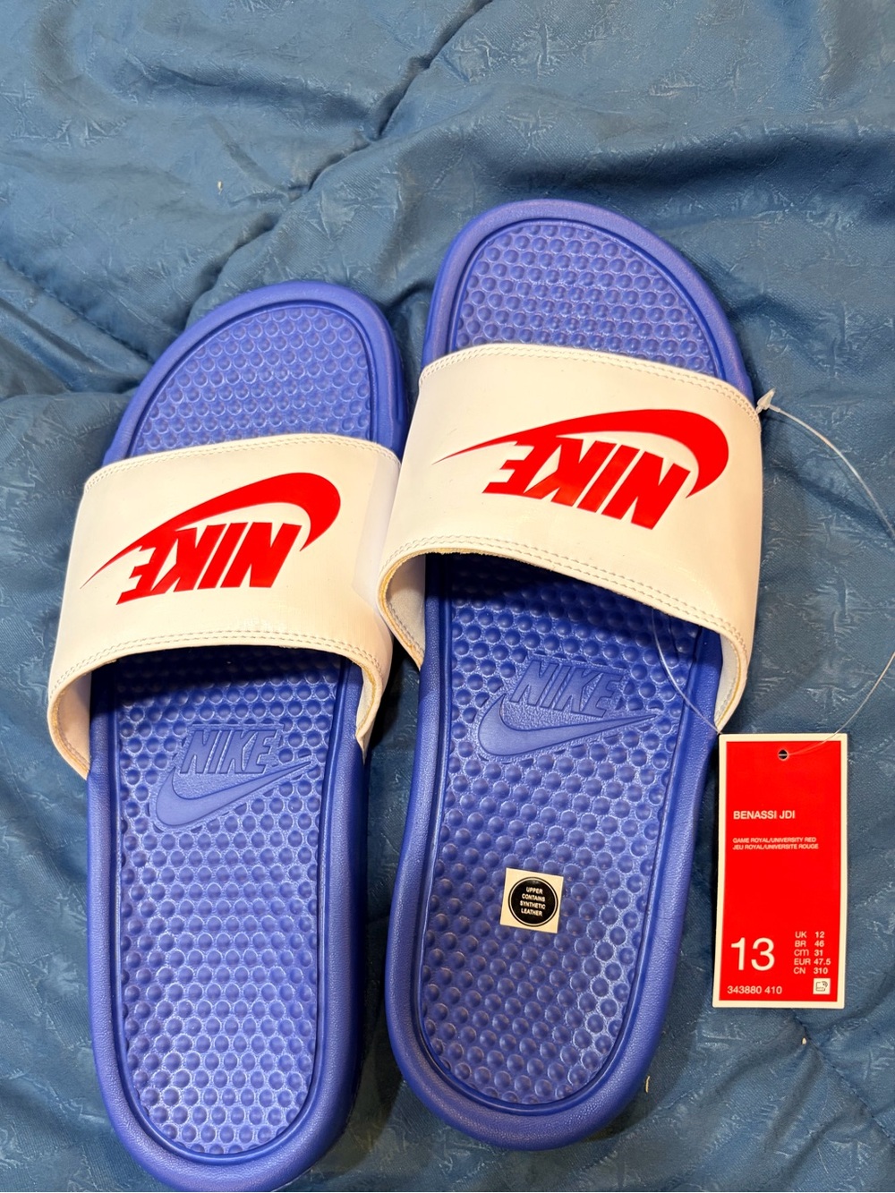Nike White Strap Slide Sandals with Blue Footbed